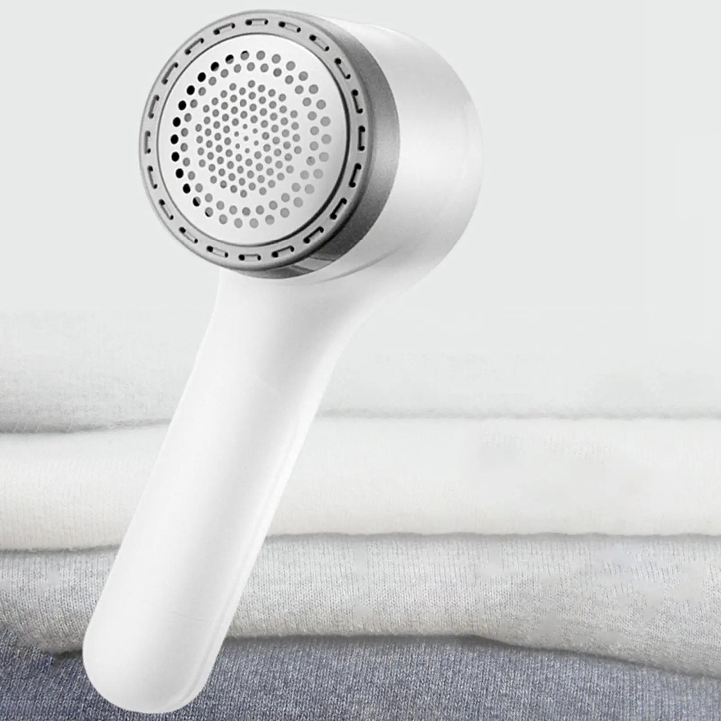 Fuzz-Free Luxe - Instantly Revive Your Clothes to Look Brand New!